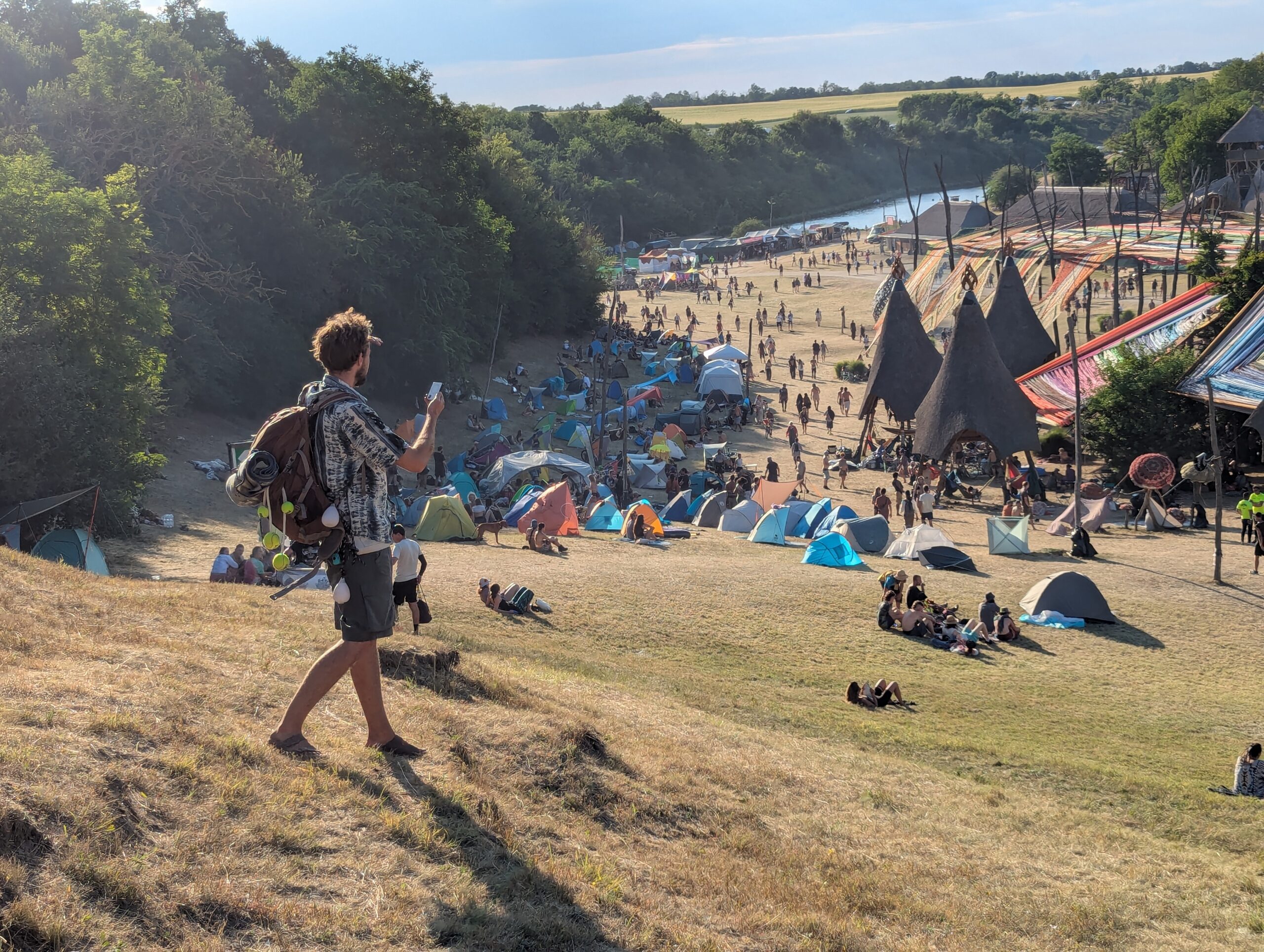 Person using a Buddycompass festival tracker at a music festival.