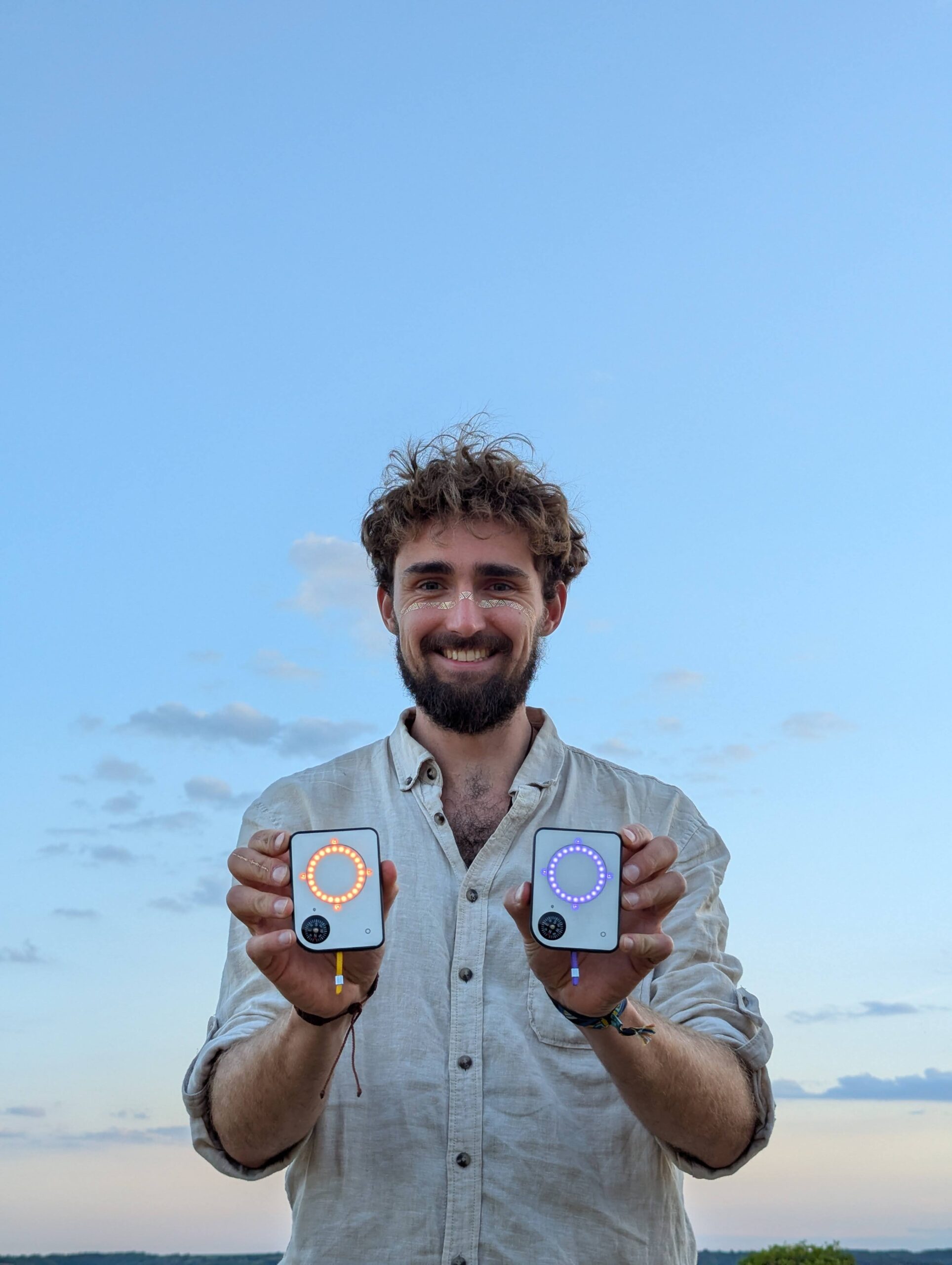 Person using a Buddycompass festival tracker at a music festival.