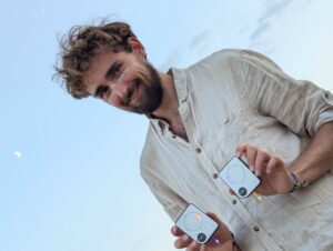 Person using a Buddycompass festival tracker at a music festival.