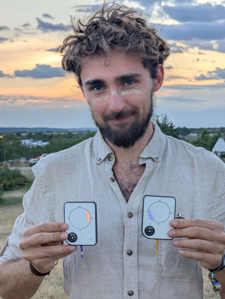 Person using a Buddycompass festival tracker at a music festival.