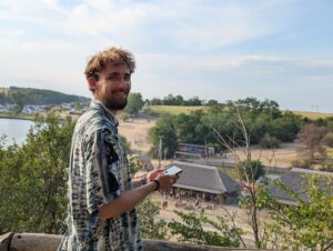 Person using a Buddycompass festival tracker at a music festival.