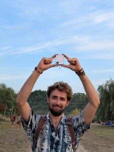 Person using a Buddycompass festival tracker at a music festival.